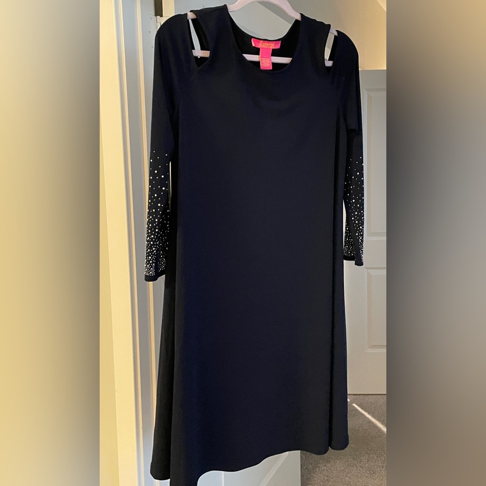 Navy blue dress with jeweled sleeves and cold shoulder design. Size Large